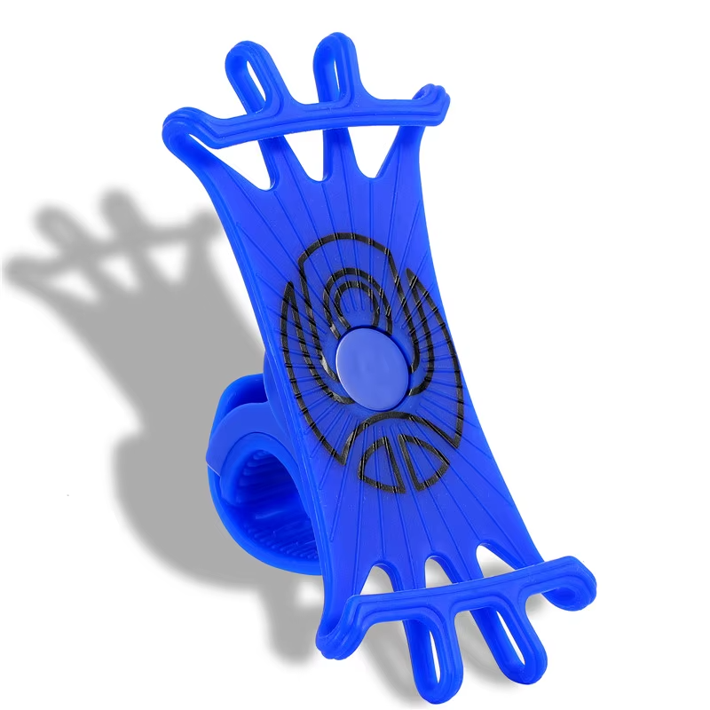 The Blue silicone holder from Tampa Bay eBikes, known as the Cell Phone Holder - Stretch, features multiple finger slots with a flexible design. It has a circular center area with black patterns and is compatible with phones, casting a shadow on a white backdrop.