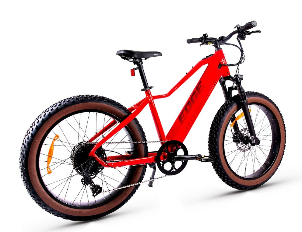 The Magnum - Edge by Tampa Bay eBikes, a red fat-tire eBike with thick brown tires, front suspension fork, 750W motor, and disc brakes, is shown on a white background.