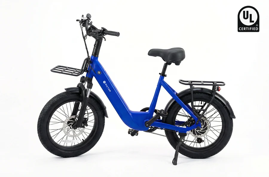 Blue Rictor Glyde electric bike with a 750W motor, front cargo rack, rear luggage rack, and a UL Certified badge in the corner.