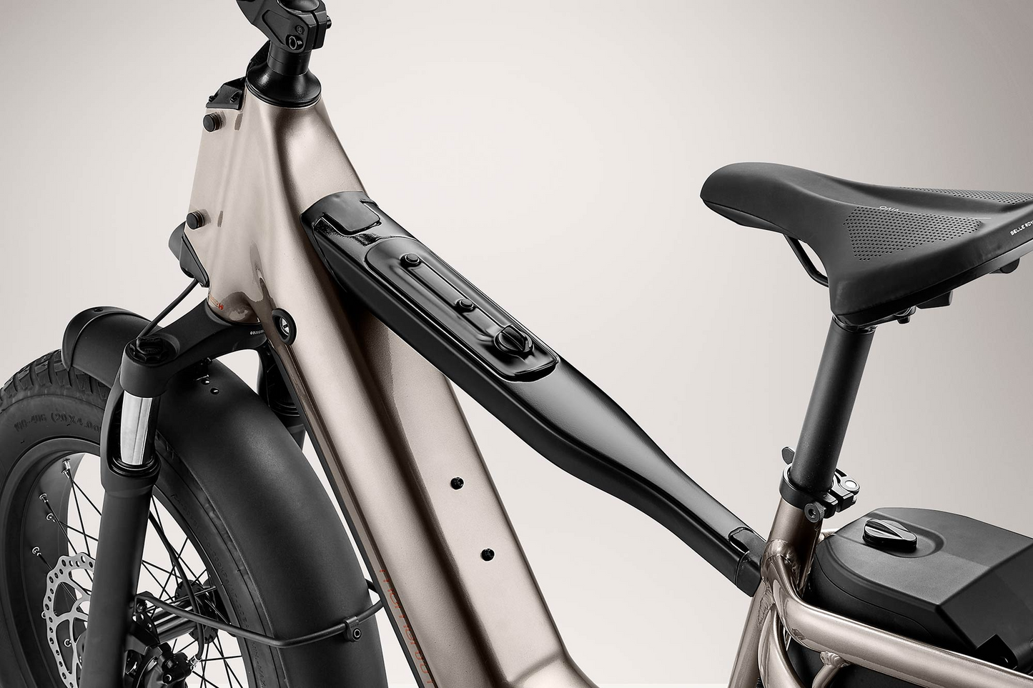 Close-up view of a modern Momentum - Cito E+ electric bicycle showing the battery integration, frame, and rear wheel.