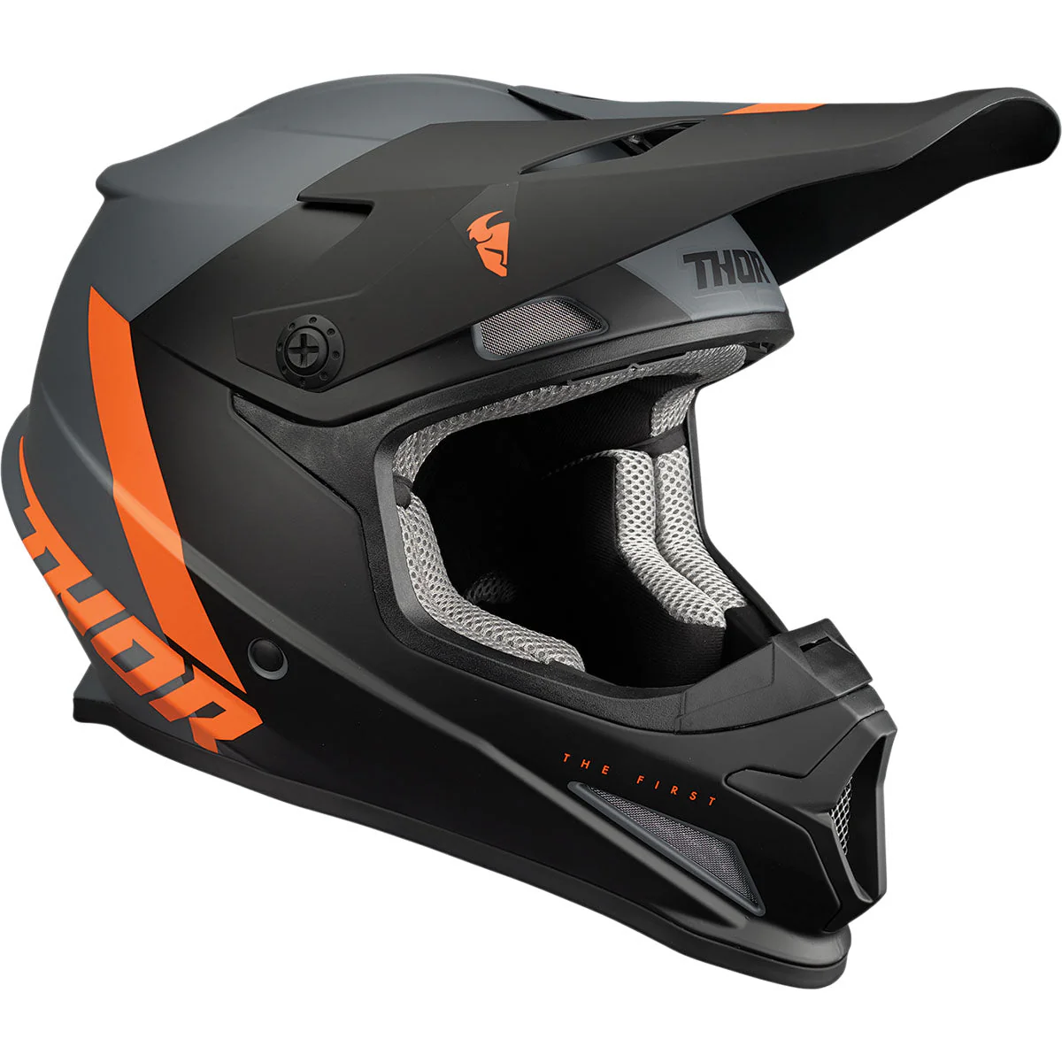The Thor Sector Helmet - Chev in charcoal and orange features orange accents, visor, ventilation, and “THOR” logos on the side and front. This DOT certified Thor helmet combines style with reliable motocross protection for every ride.