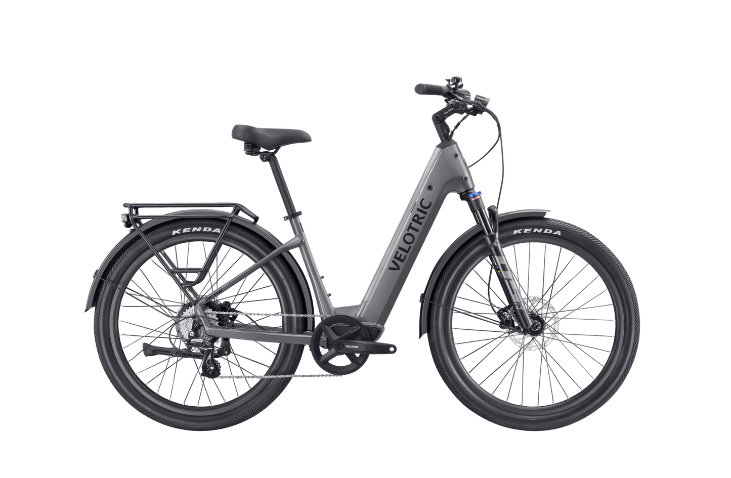 A gray Velotric - Discover 2 with Kenda tires, a step-through frame, black saddle, disc brakes, and a rear cargo rack showcases advanced eBike engineering.