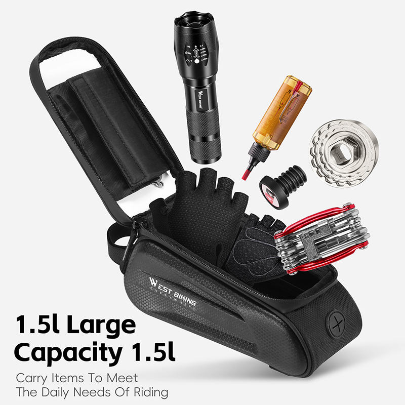 The Tampa Bay eBikes Cell Phone Top Tube Bag, a black 1.5L bag made from durable material, is shown open with a flashlight, gloves, screwdriver, bike lock, valve cap, and multitool displayed above it.