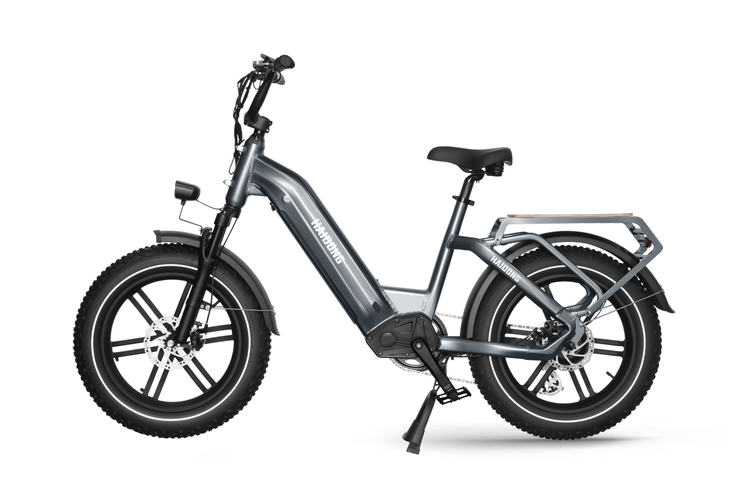The powerful 750W gear motor on the Himiway Big Dog Grey electric bike, made by Himiway, makes it perfect for long-distance travel. It is parked in front of a curtain.