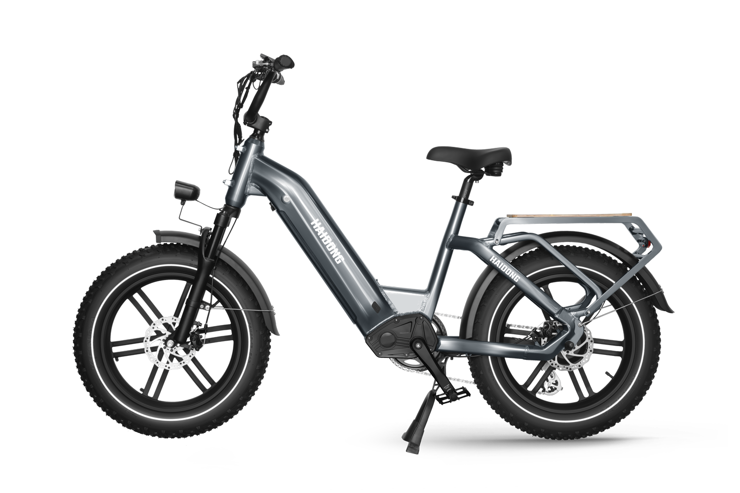 The powerful 750W gear motor on the Himiway Big Dog Grey electric bike, made by Himiway, makes it perfect for long-distance travel. It is parked in front of a curtain.