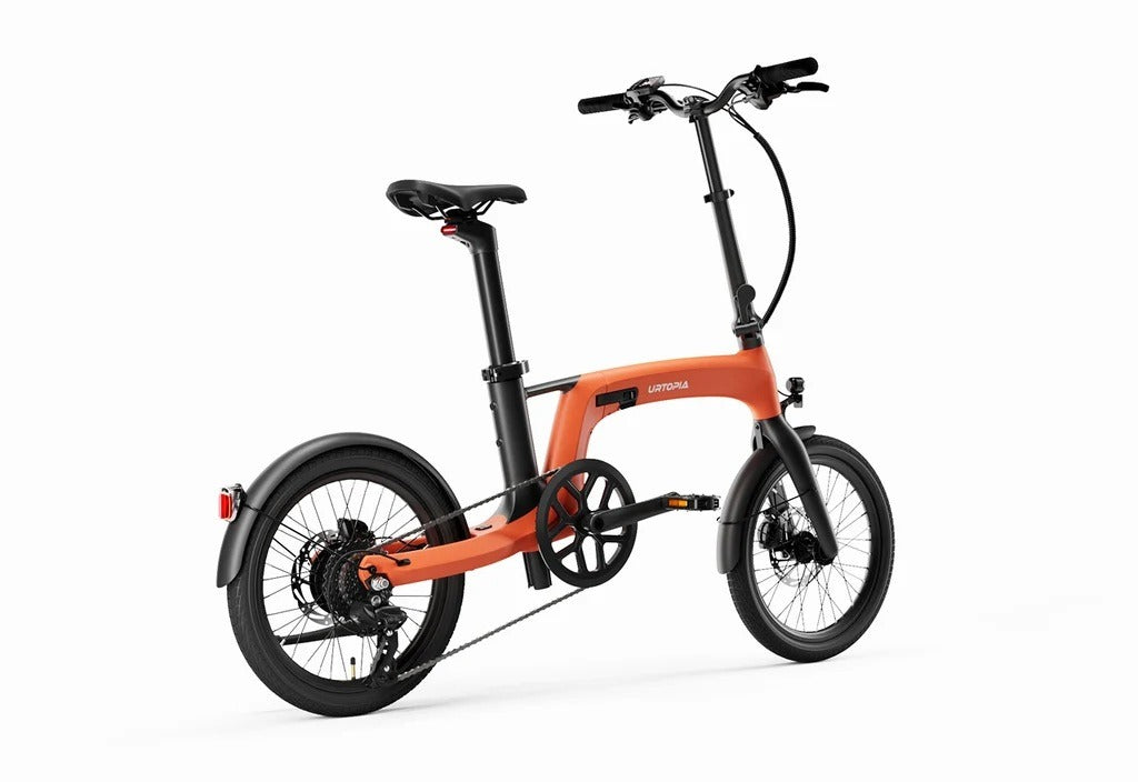 Urtopia Carbon Fold 2 in Orange, complete bike viewed from the rear three-quarter angle