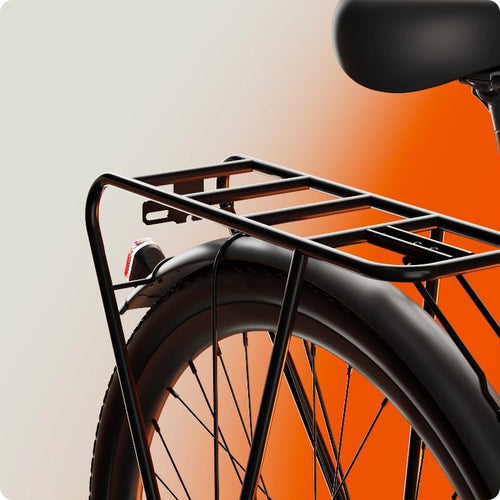 Close-up of Urtopia - Carbon Classic’s rear wheel, fender, and cargo rack against a white-orange gradient background, showcasing the sleek design and lightweight build of this Urtopia electric bike.