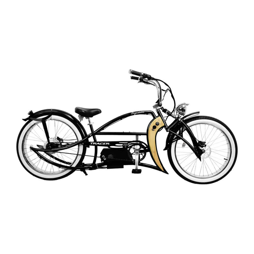 The Tracer Signature Pro 26'' 800W Chopper Cruiser E-Bike, featuring whitewall tires, a banana seat, and detailed chrome accents, is shown in a side profile view.