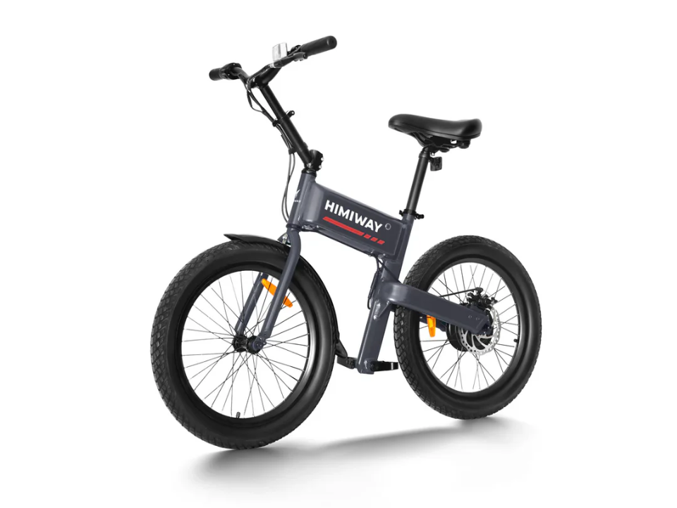 A black Himiway Pony Mini E-Bike with thick tires, front and rear fenders, and an upright seat is displayed on a white background. This compact Himiway bike features a powerful 300W motor for smooth, efficient rides.