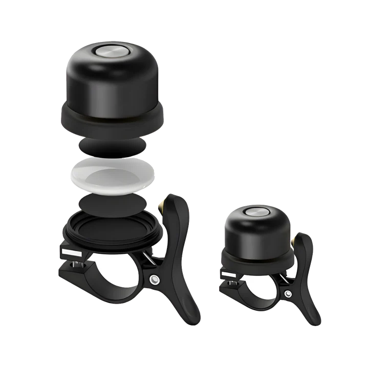 An exploded view of the Urtopia AirTag Kit, a black bicycle bell by Urtopia designed to hide an AirTag for eBike security, is displayed next to a fully assembled bell on a white background.