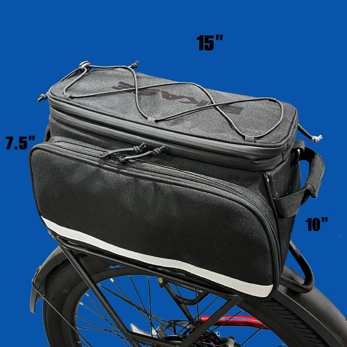 The Bikase Big Poppa MIK is a black bike pannier with elastic cords on top, measuring 15" x 10" x 7.5". This waterproof rack bag is mounted on a rear bike rack against a blue background.