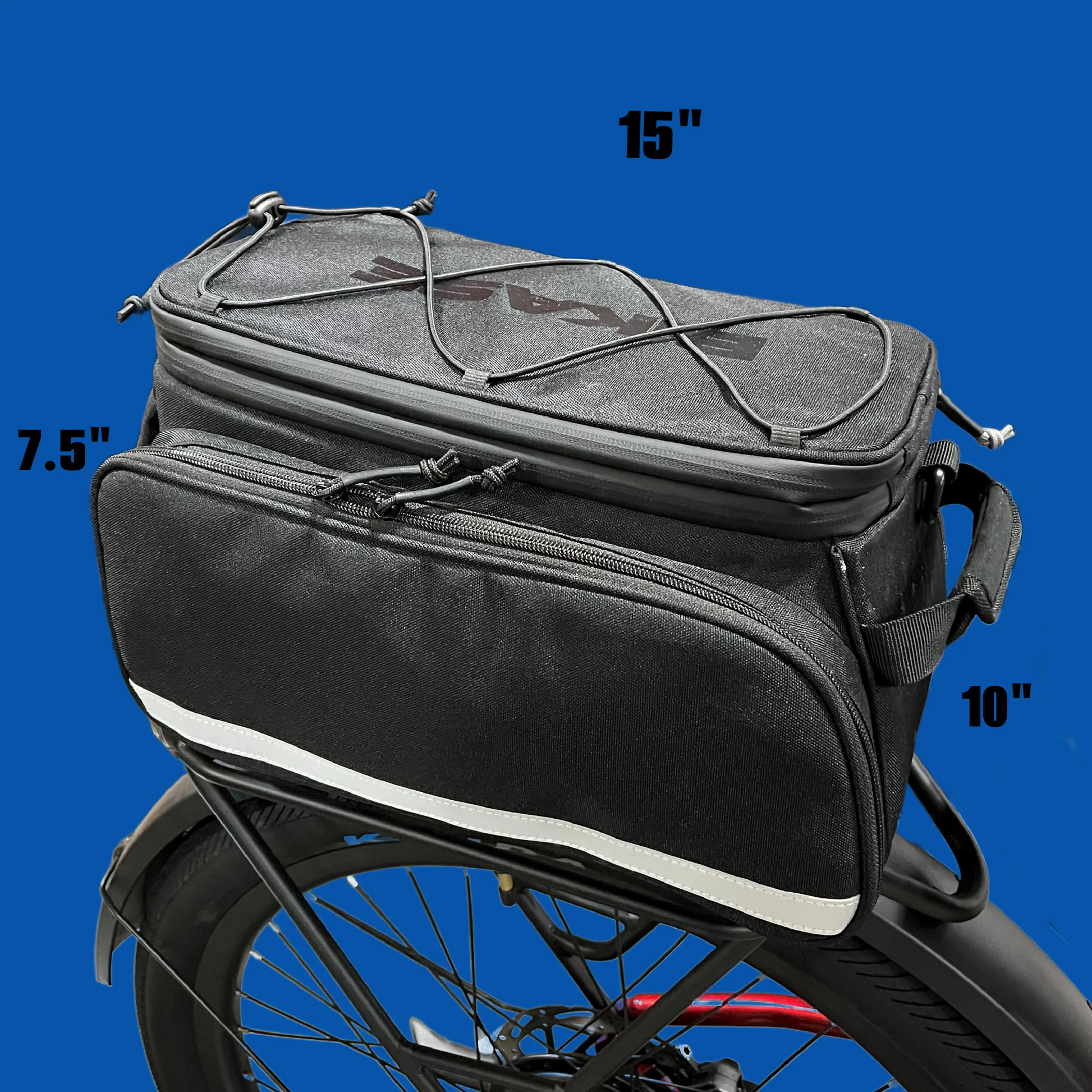 The Bikase Big Poppa MIK is a black bike pannier with elastic cords on top, measuring 15" x 10" x 7.5". This waterproof rack bag is mounted on a rear bike rack against a blue background.