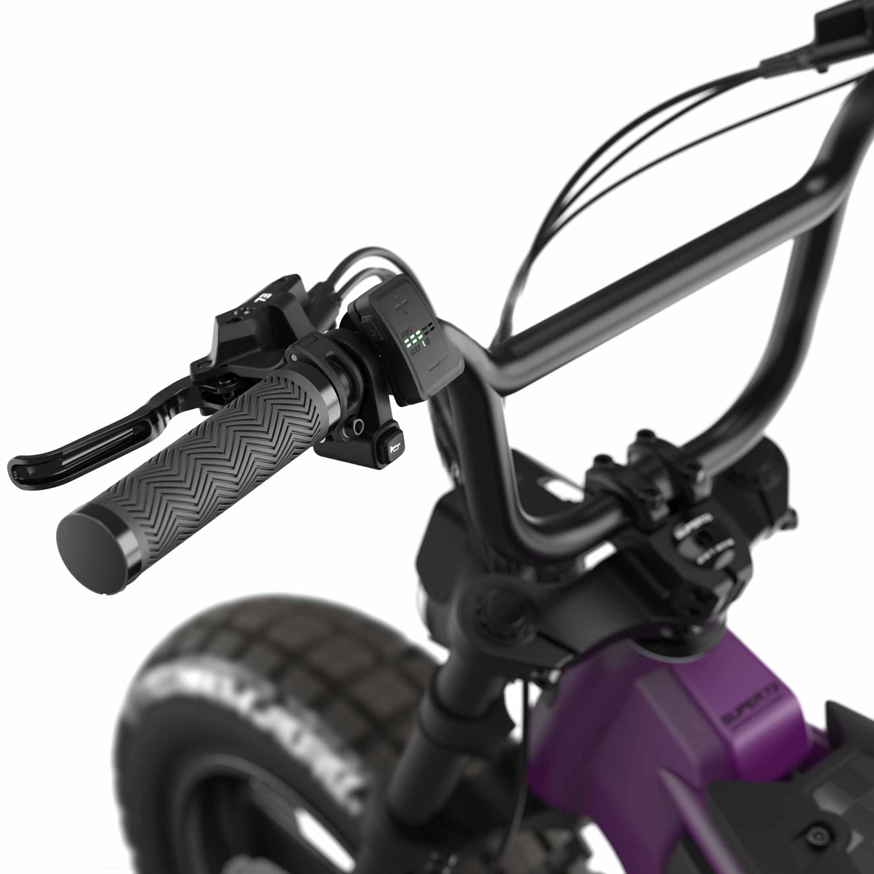 Close-up of a Super 73 - MZFT electric bike's left handlebar, highlighting the grip, brake lever, control buttons, and part of the front tire and frame on this Super 73 moto-inspired eBike.