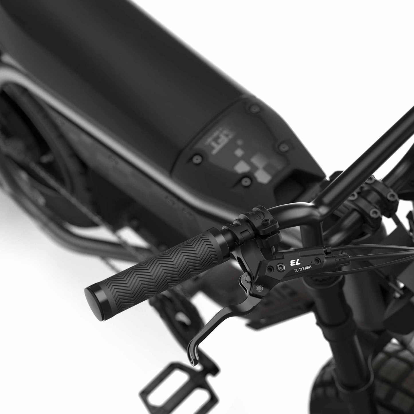 Close-up of the Super 73 - MZFT eBike’s handlebar, brake lever, and digital display panel by Super 73, highlighting the textured grip and part of the pedal against a white background.