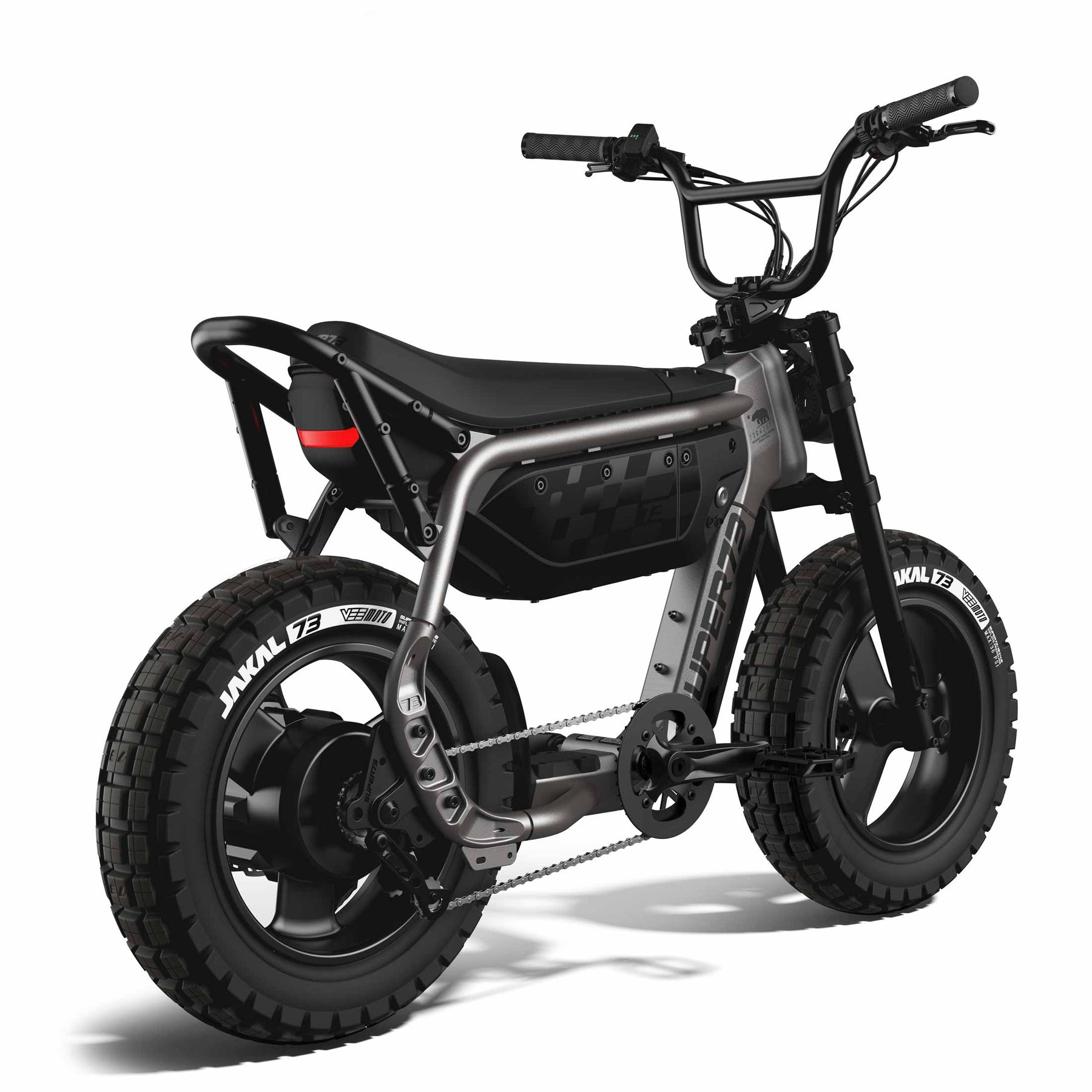 The Super 73 - MZFT by Super 73 is a black and silver, moto-inspired eBike featuring thick tires, a padded seat, and chain drive, shown from a slight rear angle.