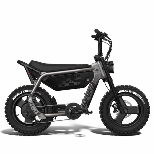The Super 73 - MZFT by Super 73 is a matte black, moto-inspired eBike featuring thick off-road tires, a low seat, and a minimal frame, shown in profile against a white background.