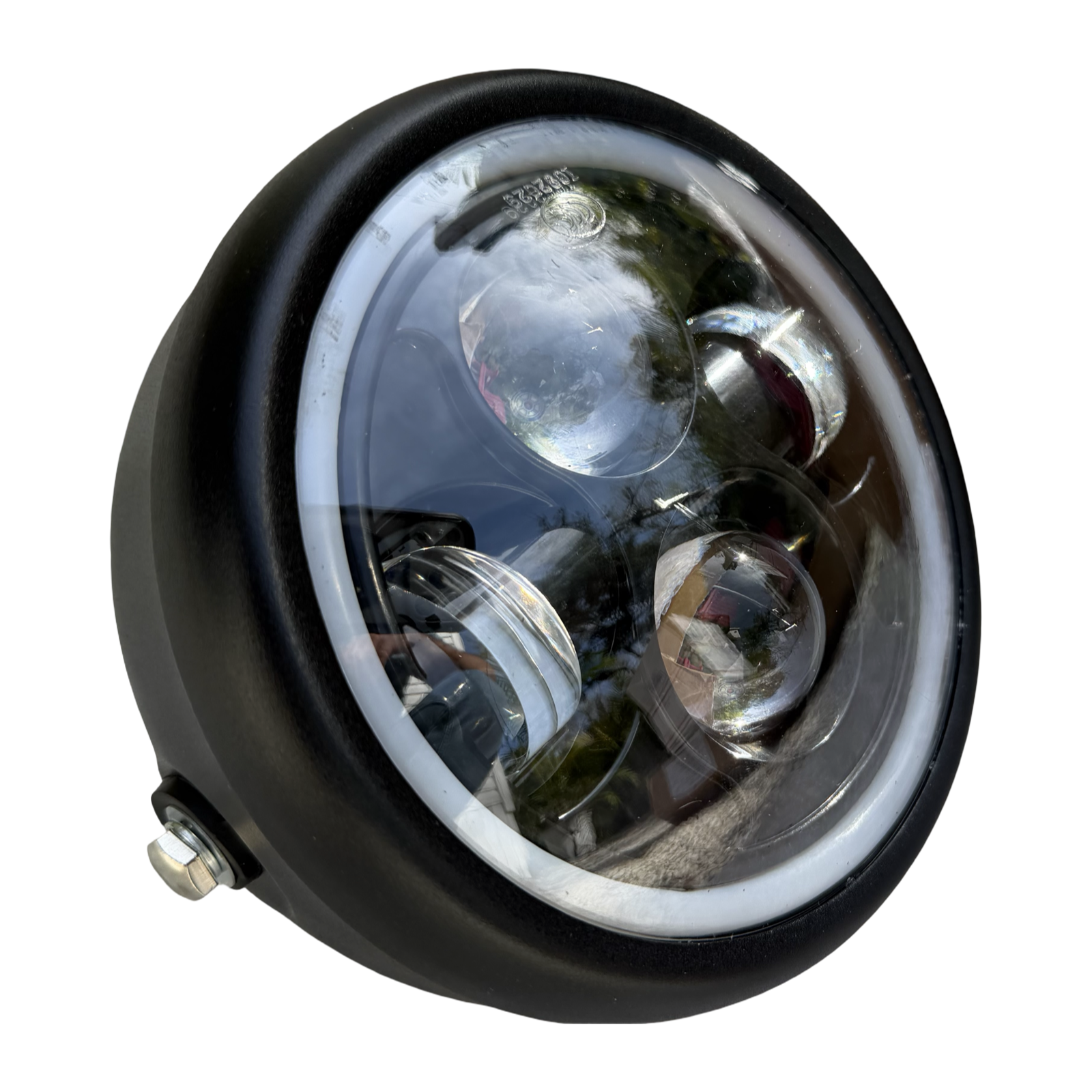A close-up of the ElectricAllWheel RST Guide Dual Crown Fork (26” Fat Tire) and Motorcycle Style LED Headlight Kit (12V, 2-pin Julet) shows the round black headlight with clear lens and multiple LEDs, isolated on a white background.