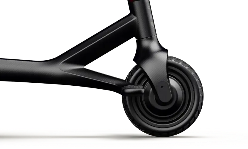 Close-up of the Dashmoto Dash 3's black carbon fiber front wheel and fork, highlighting its sleek design and powerful 500W motor by Dashmoto, set against a plain white background.