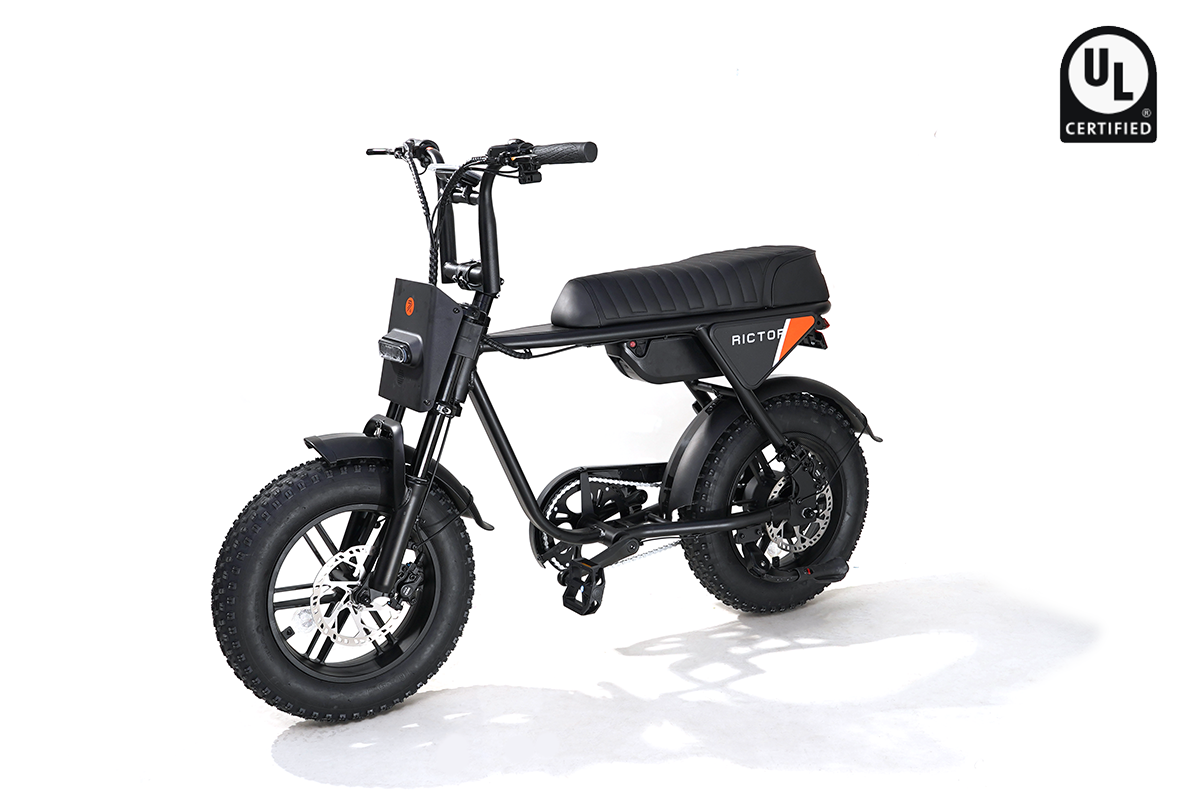 The Rictor - Flexx by Rictor is a black, moped-style electric bike with wide tires, padded seat, and pedals. Shown on a white background with a UL Certified logo in the top right corner.
