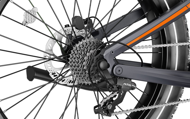 Close-up of a HeyBike - Hero (Mid-Drive) rear wheel, showing detail of the cassette, derailleur, and disc brake on a white background.