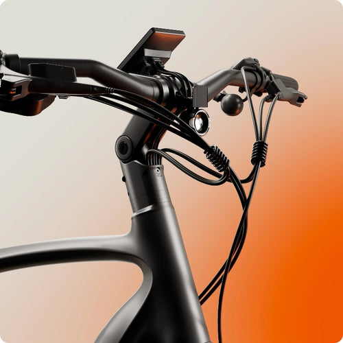 Close-up of the Urtopia Carbon Classic handlebar with display, brake levers, and cables against a gradient orange background, showcasing the lightweight carbon fiber eBike’s sleek Urtopia design.
