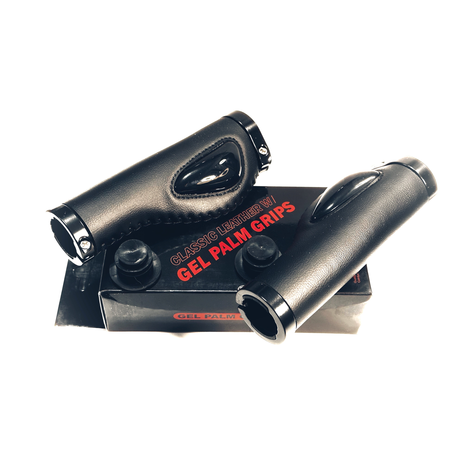 Two black classic leather gel palm grips rest on their packaging, reading "Classic Leather IV Gel Palm Grips"—ideal for pairing with the ElectricAllWheel Thumb Throttle Conversion Kit (Lectric/AIPAS Fit) for added comfort and control.