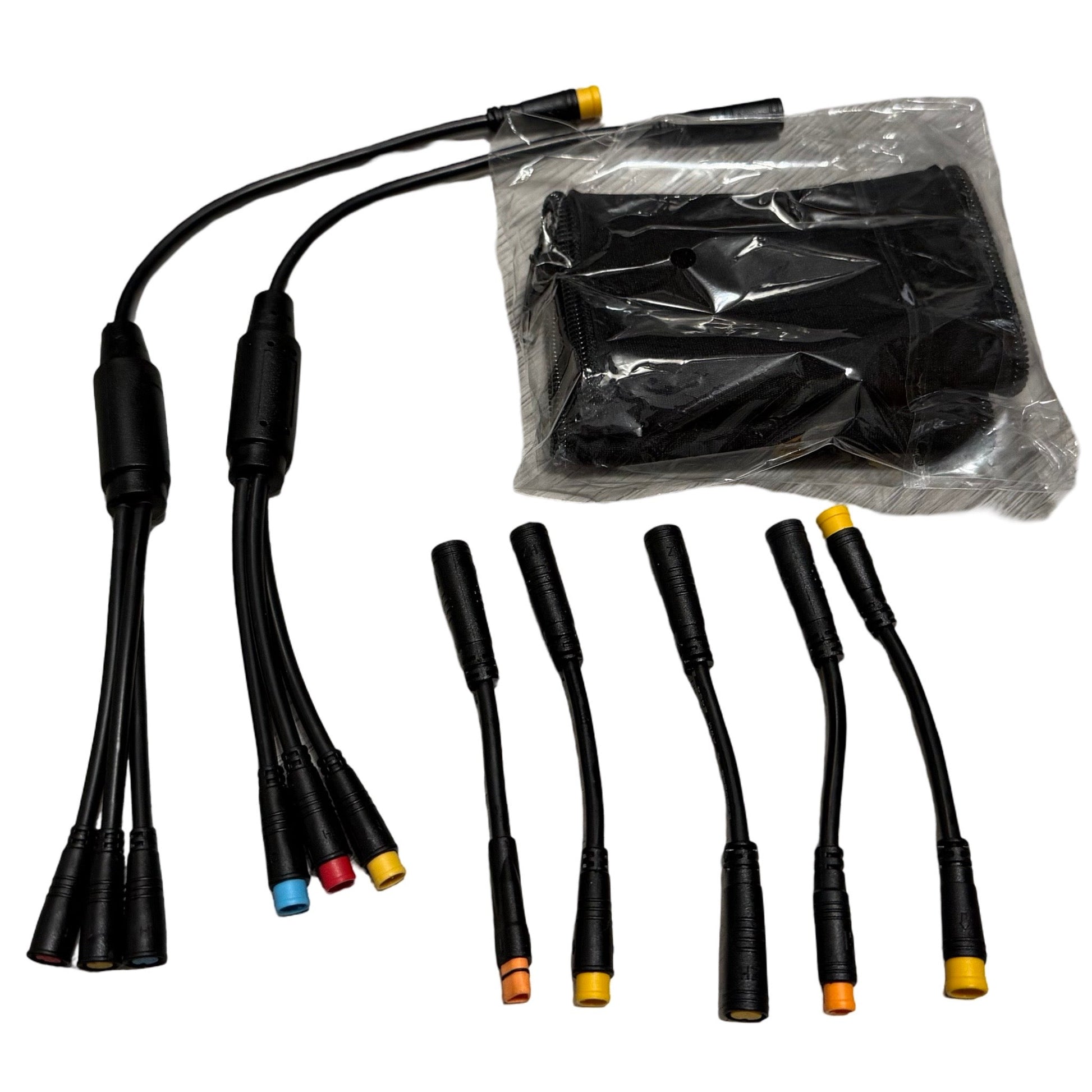 A set of ElectricAllWheel black wiring adapters with colored tips and connectors, including the Universal Throttle Harness (3-Pin) for e-bikes, accompanied by a sleek black rectangular pouch. Some items remain sealed in plastic packaging, all neatly arranged on a white background.