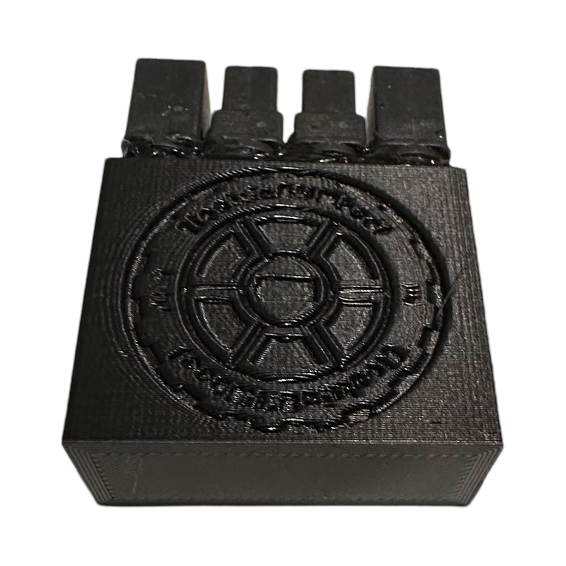 A black rectangular ElectricAllWheel DateX2 Dx2 30A (60A MAX) Universal Dual Battery Dual Output Discharge Balancer Kit featuring a raised circular emblem and four tabs, shown isolated on a white background.