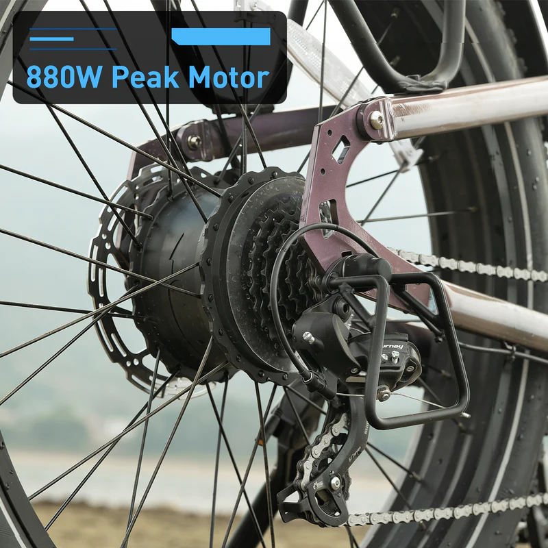 Close-up of the Hiboy - EX11’s rear wheel, showcasing its gear system and powerful 880W peak motor on this full suspension electric bike by Hiboy, set against a softly blurred outdoor backdrop.