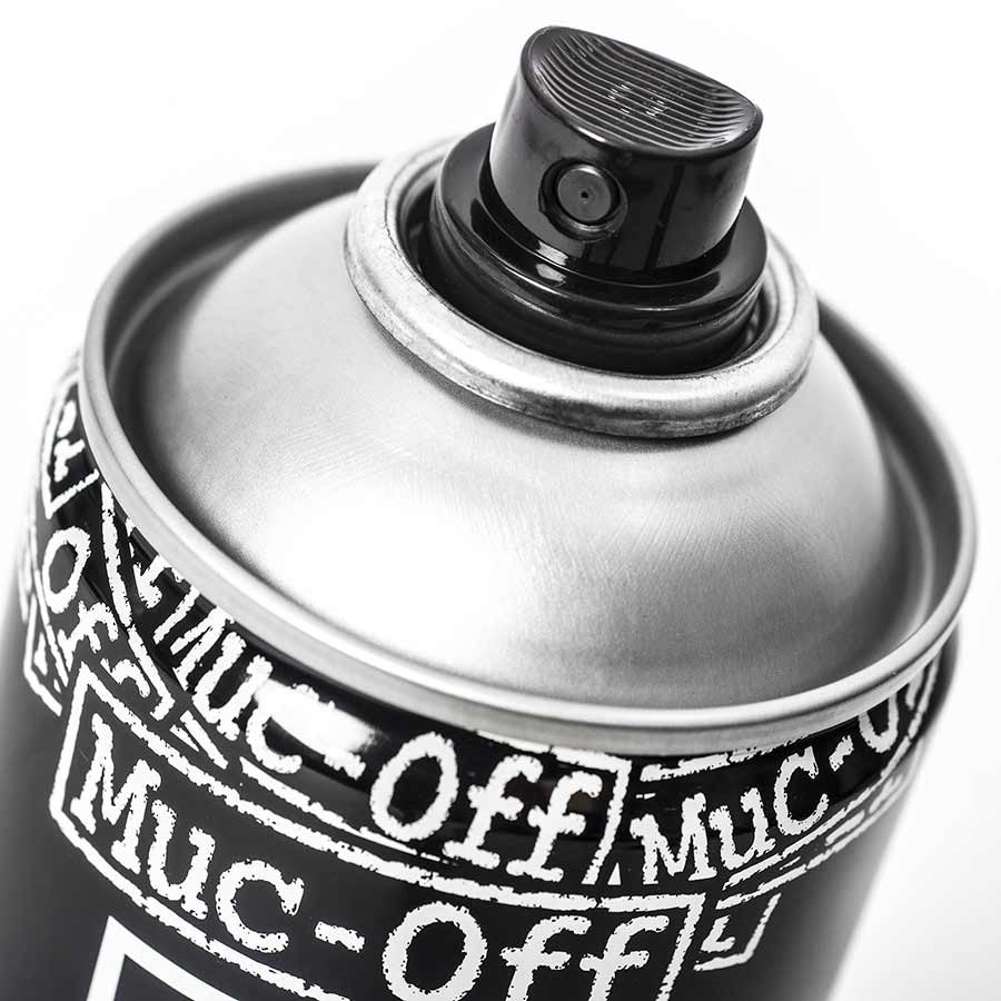 A Muc-Off - Bike Protect spray paint can designed for bikes with the word "muc-off" on it.