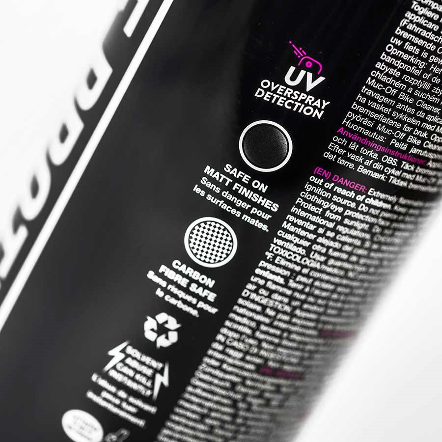 A close up of a black bottle with a purple label containing Muc-Off - Bike Protect, a corrosion inhibitor.