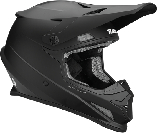 The Thor Sector Helmet - Blackout is a matte black full-face helmet with visor and mesh vents above the face opening, DOT certified for off-road riding.