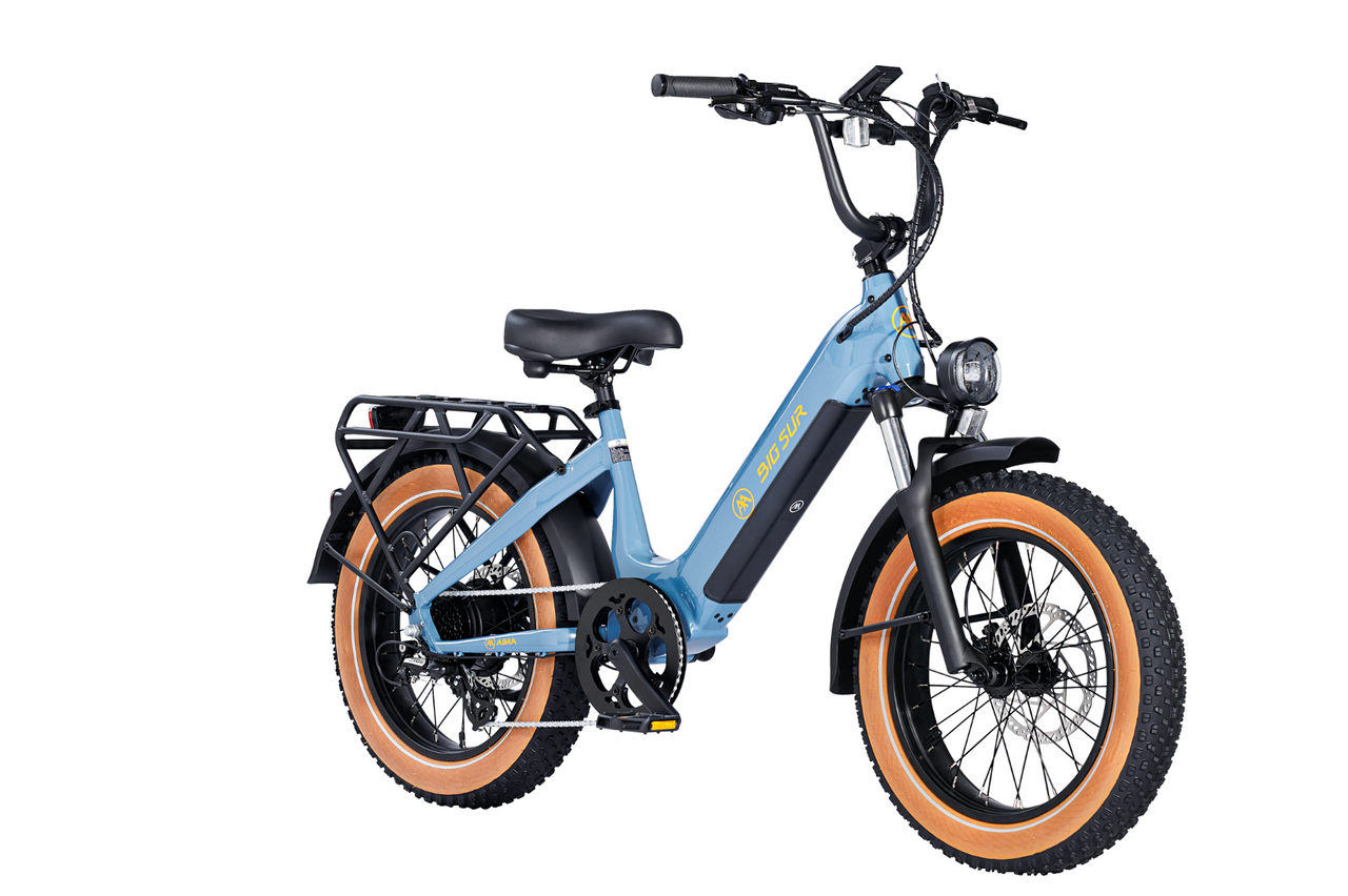A powerful AIMA - Big Sur Sport electric bike designed for all terrains, with fat tires, in shades of blue and orange, against a white background.