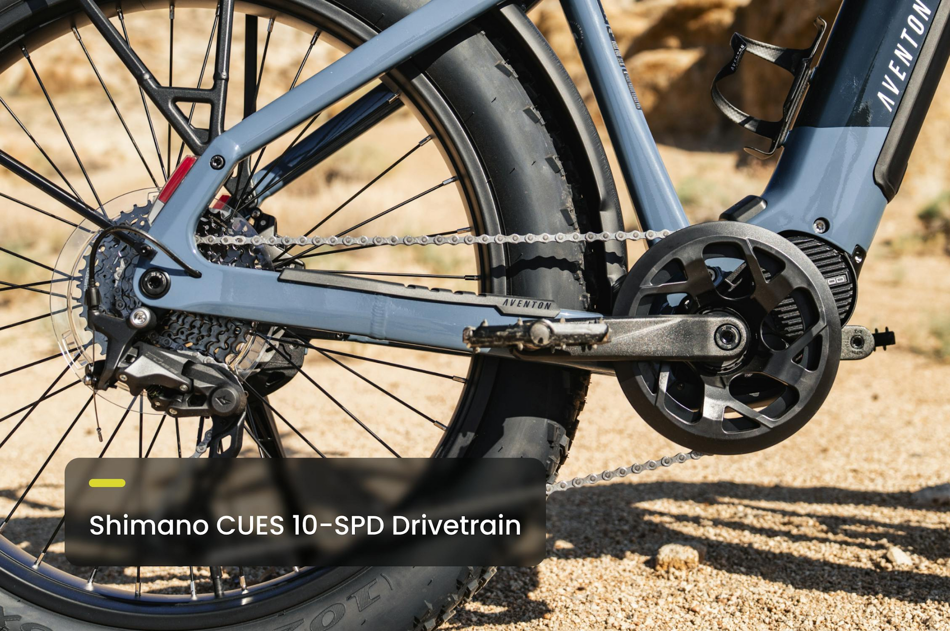 Close-up of Tampa Bay eBikes’ Aventon - Aventure M, highlighting its Shimano CUES 10-speed drivetrain—rear derailleur, chain, and crankset—for powerful performance on gravel with this mid-drive fat tire eBike.