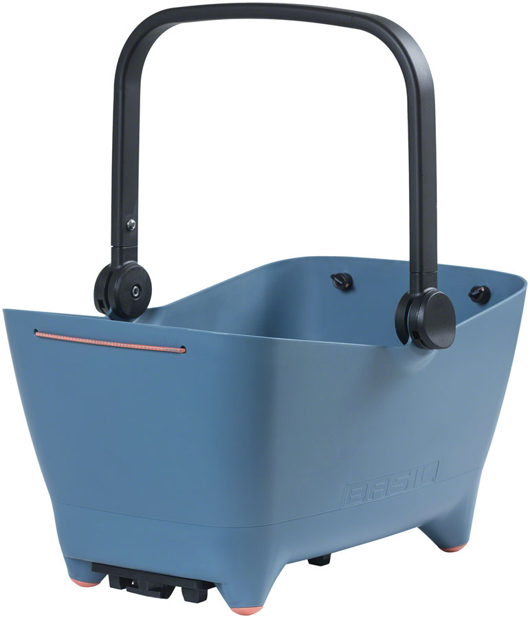 The Basil Buddy Dog Basket MIK by Basil is a blue plastic basket with a black adjustable handle, made for bicycle rear racks. It’s MIK compatible and ideal as an eBike accessory.