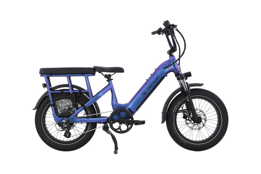 The AIMA Big Sur U Cargo electric bike by AIMA is shown in profile against a white background, featuring a blue frame, rear cargo rack, front suspension, disc brakes, and a kickstand.