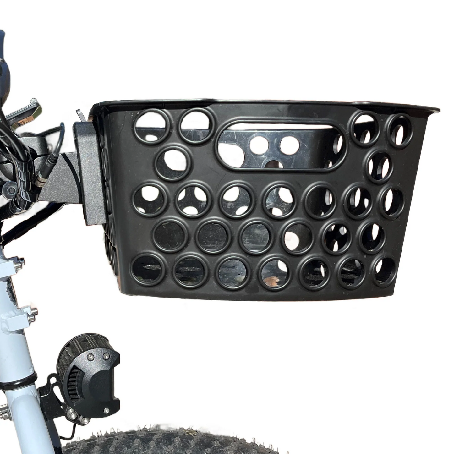 Close-up of a bicycle with the Bikase Front Basket, featuring a pattern of circular holes and an adjustable clamp for universal handlebar attachment.