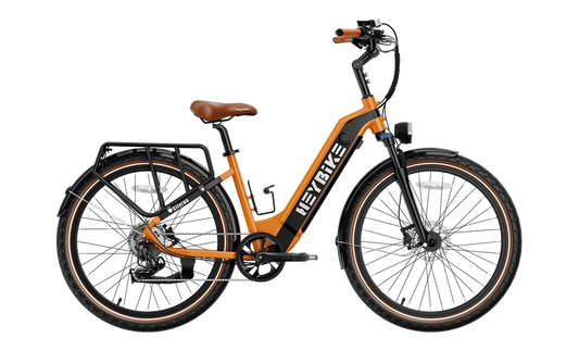 Orange and black HeyBike- Cityrun ebike with a rear rack and hydraulic front suspension, displayed against a plain black background.