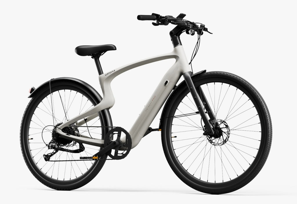 The Urtopia Carbon Classic eBike by Urtopia features a matte white carbon fiber frame, black saddle and tires, built-in battery, and pedal-assist system—stylish, lightweight, and shown on a clean white background.