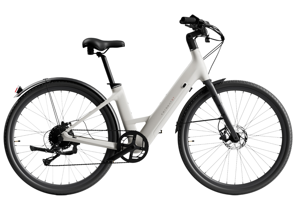 The Urtopia Carbon Classic Step-Thru, a lightweight carbon eBike by Urtopia, features a step-through frame, black saddle and handlebars, disc brakes, rear fender, and a removable Samsung battery. Shown in side profile against a plain background.