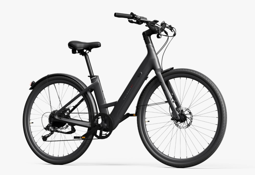The Urtopia Carbon Classic Step-Thru by Urtopia is a matte black carbon eBike with a removable Samsung battery, disc brakes, fenders, and flat handlebars, displayed on a plain white background.