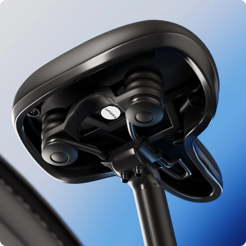 Close-up of the underside of a black lightweight carbon seat on the Urtopia Carbon Classic Step-Thru eBike by Urtopia, showing suspension springs and seat post attachment against a blue gradient background.