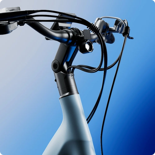 Close-up of the Urtopia - Carbon Classic Step-Thru’s lightweight carbon handlebar, cables, and stem by Urtopia, set against a blue gradient background.