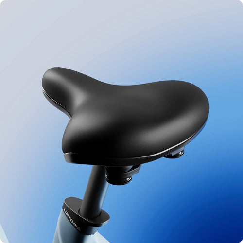 A black bicycle seat attached to a seat post of the Urtopia - Carbon Classic Step-Thru by Urtopia, displayed against a blue gradient background.