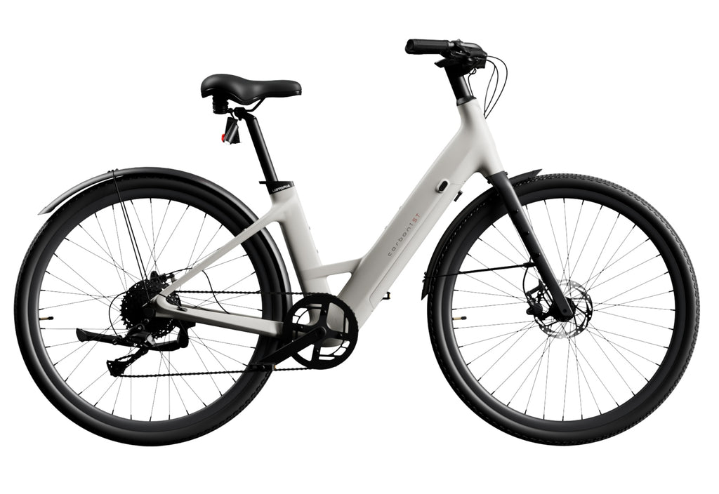 The Urtopia Carbon 1 Step-Thru is an elegant eBike featuring a step-through frame, black tires, and a matte finish. Its minimalist design includes integrated components, disc brakes, and a powerful brushless motor, embodying modern style and advanced functionality.