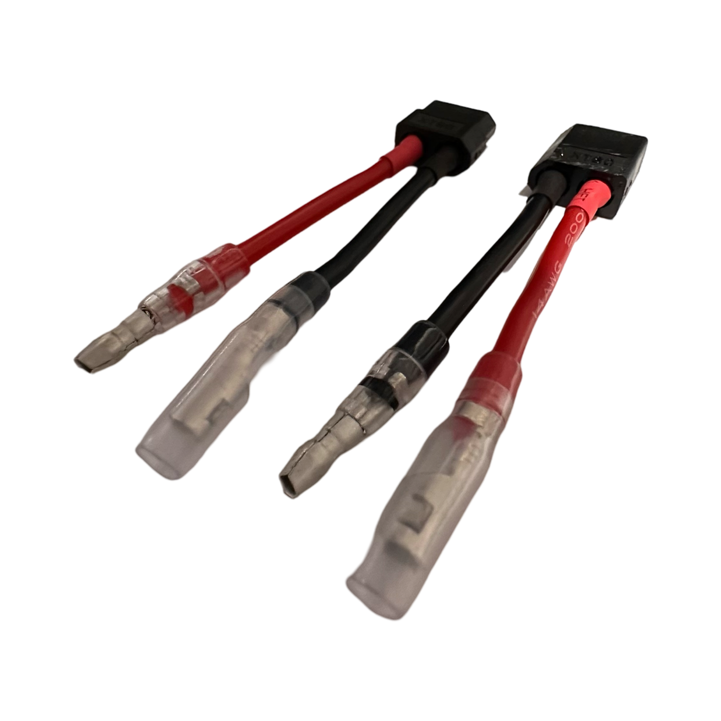 The ElectricAllWheel DateX2 Dx2 30A (60A MAX) Universal Dual Battery Dual Output Discharge Balancer Kit features red and black wire connectors with metal terminals in clear sleeves, ideal for plug-and-play or e-bike battery kits. Shown on white background.
