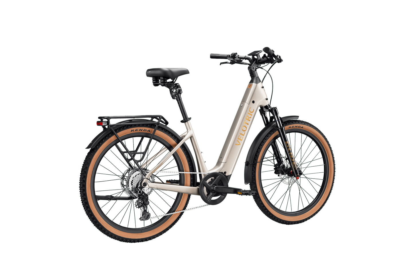 A Velotric Discover M comfort commuter eBike in beige, featuring a step-through frame, rear rack, fat tires, front suspension, and a black saddle is shown against a white background.
