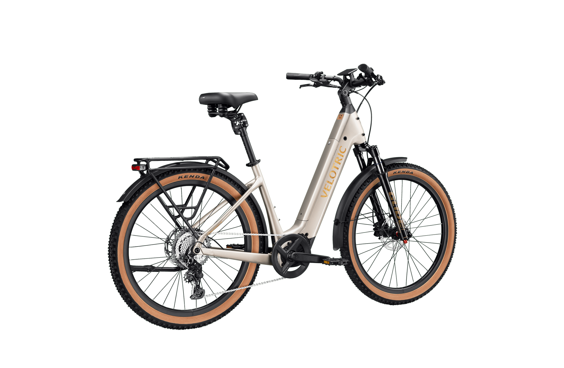 A Velotric Discover M comfort commuter eBike in beige, featuring a step-through frame, rear rack, fat tires, front suspension, and a black saddle is shown against a white background.