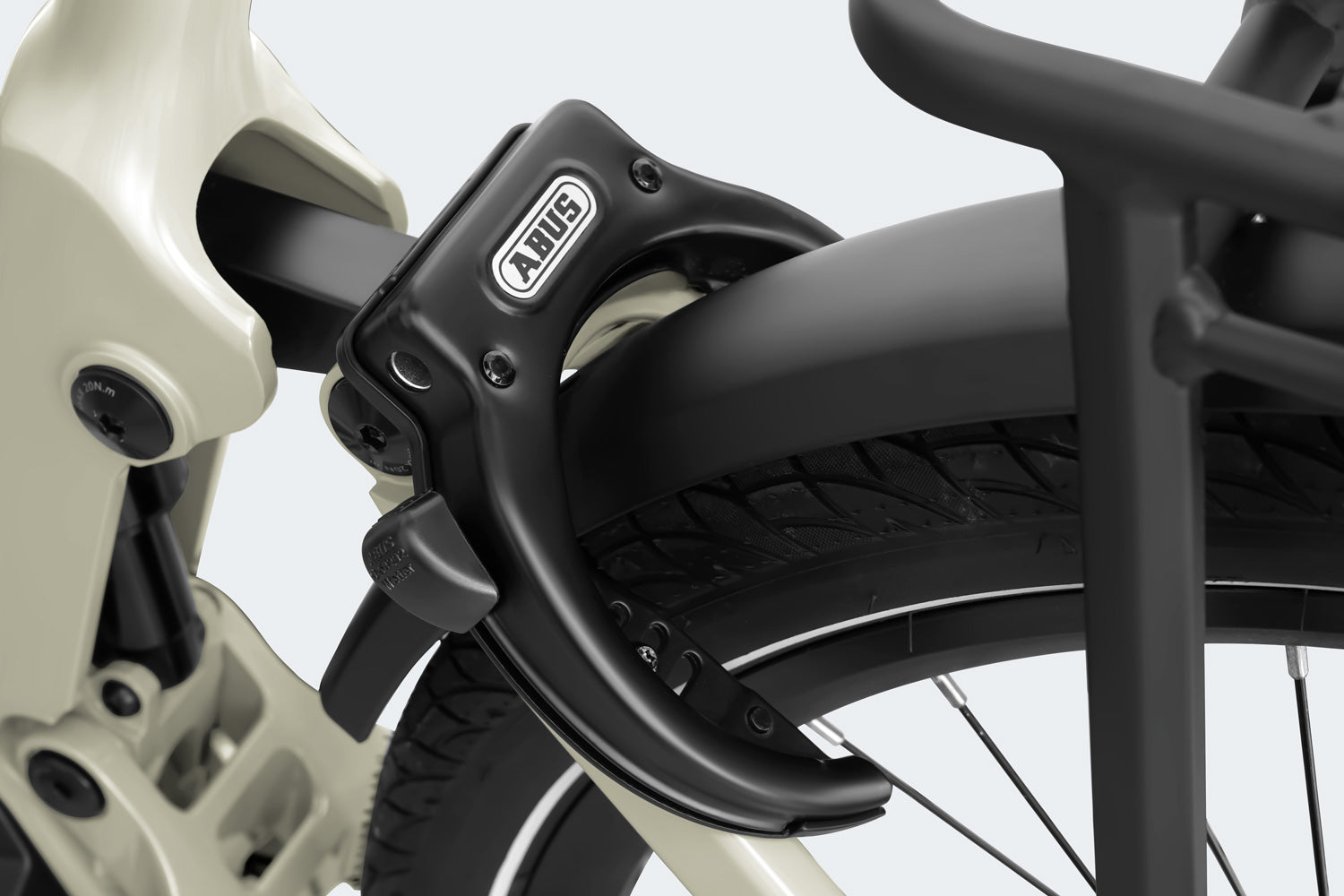 Close-up of a Himiway - A7 Pro e-bike's front suspension fork and wheel showcasing the brake mechanism and tire tread, designed for urban e-biking.