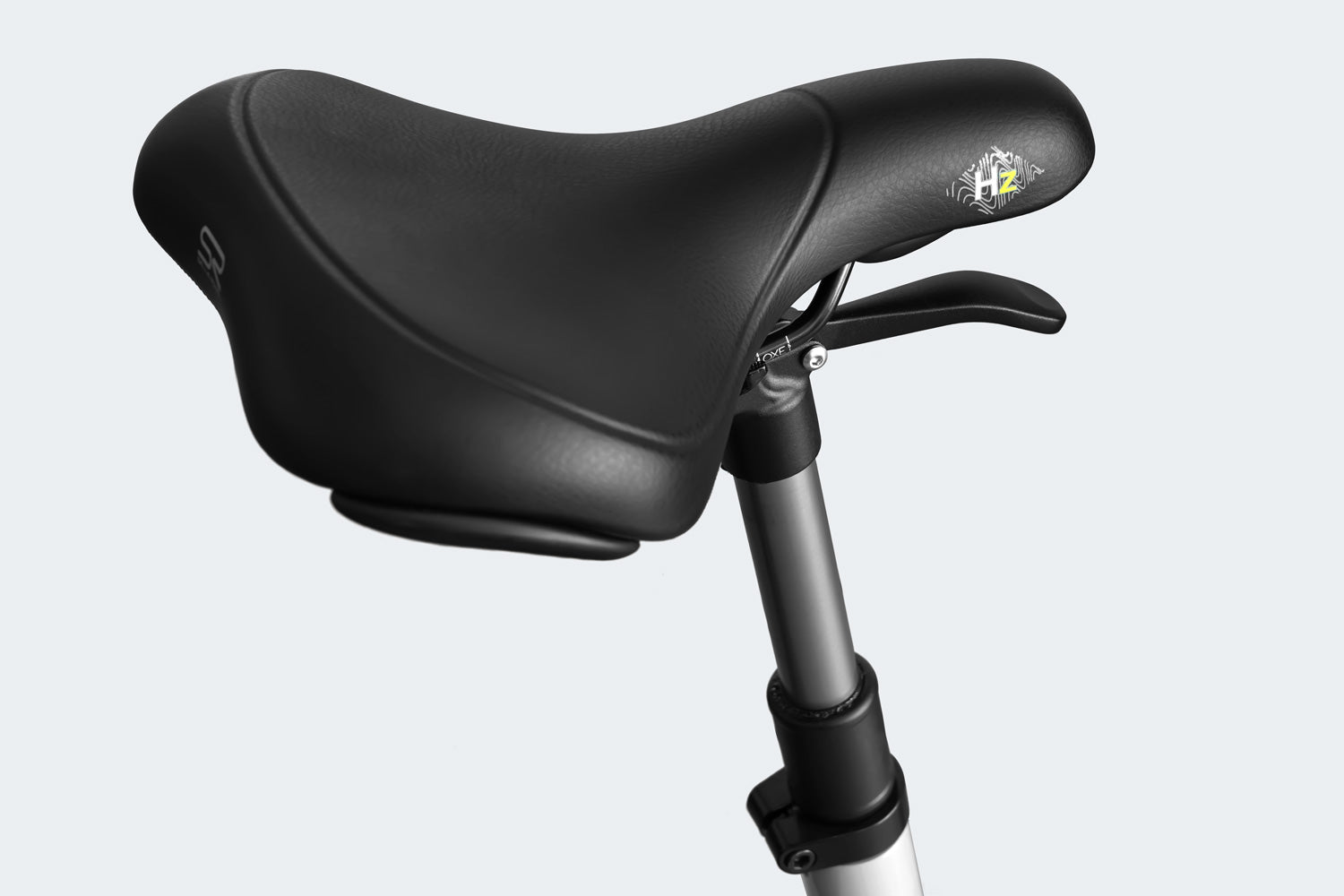 Black bicycle saddle from Himiway A7 Pro, mounted on a silver seat post, isolated on a gray background.